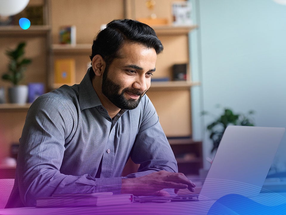 Businessman using Digital Asset Management software on his laptop