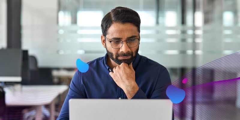 Man looking at a laptop